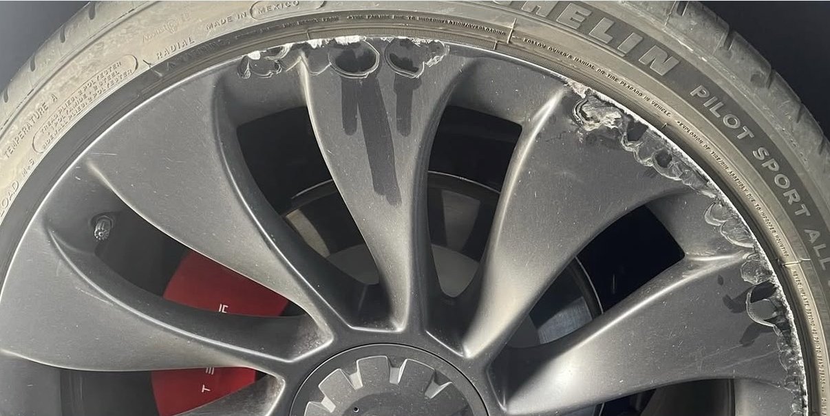Before: Tesla Model Y 21-inch Überturbine wheel with severe curb rash